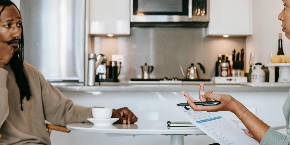 Person reaching out for support in a calm setting