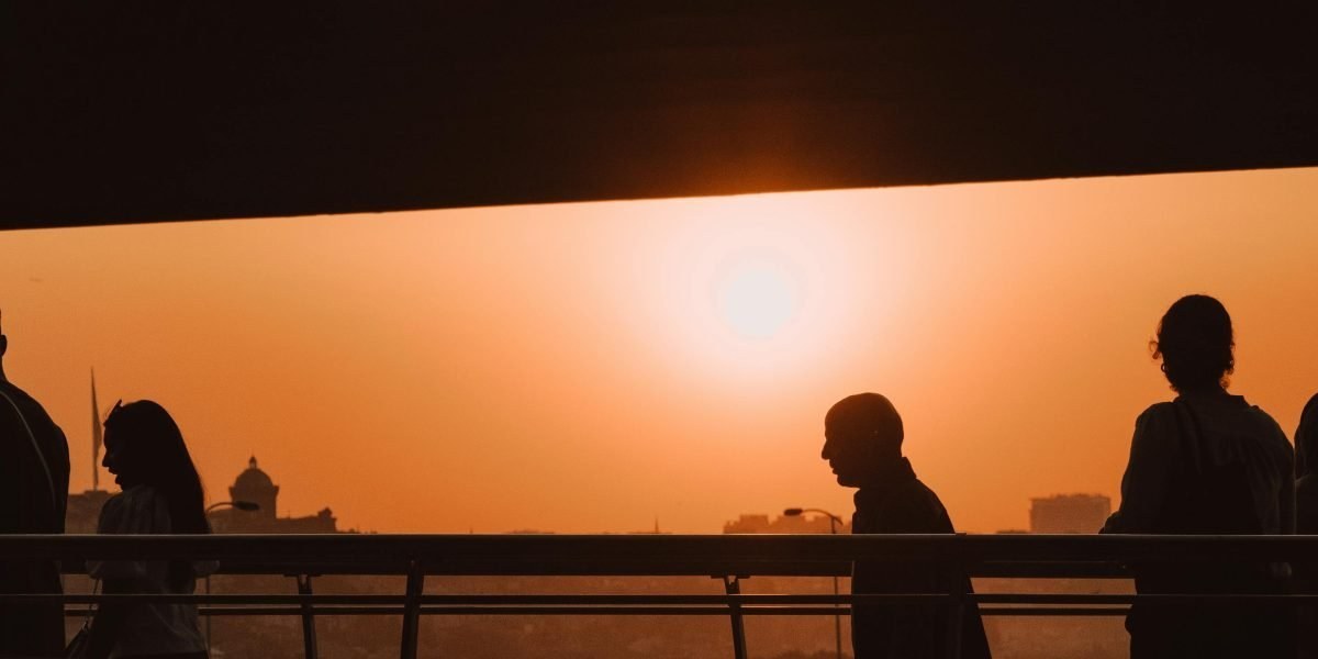 Silhouettes of people connecting in a social setting