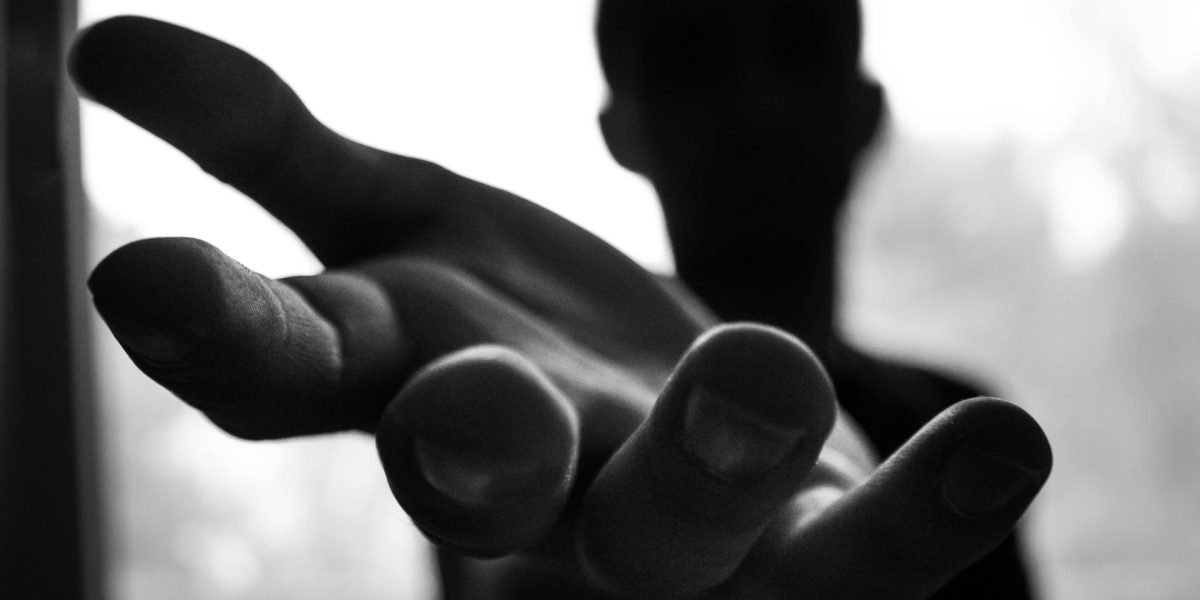 Illustrating the courage to take the first step towards seeking mental health support by reaching out.