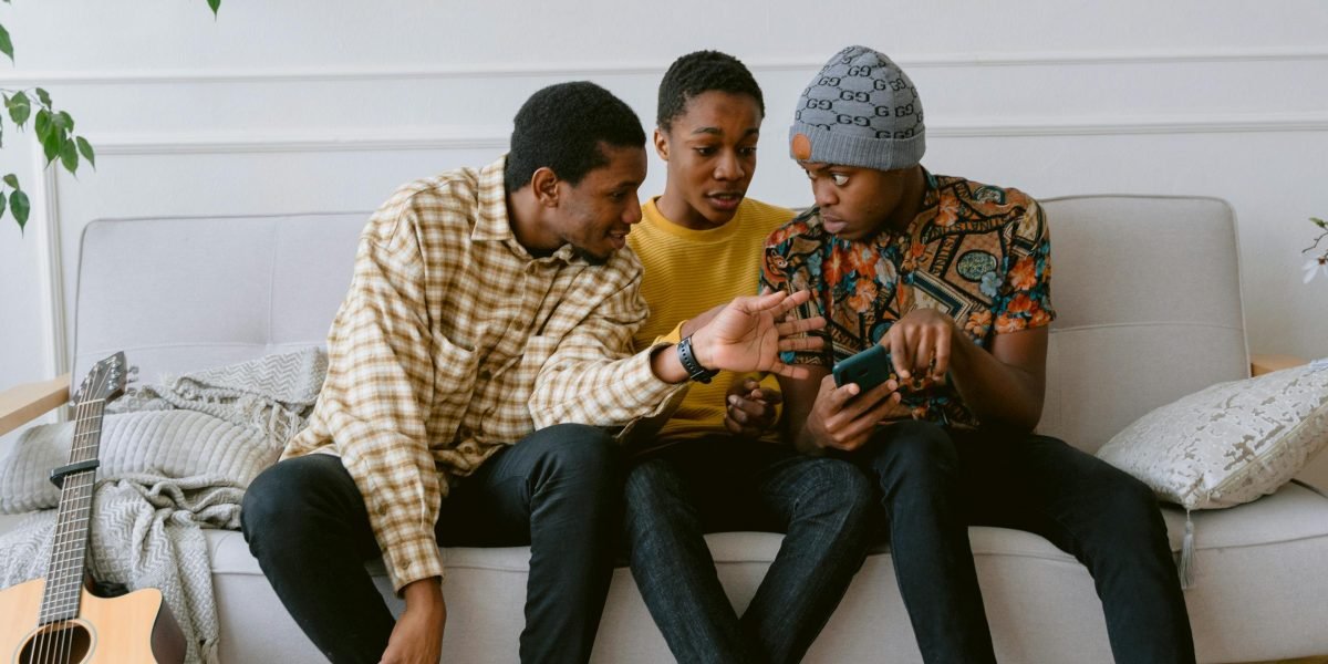 A group of men engaging in a shared activity, demonstrating how common hobbies can foster friendship and connection.