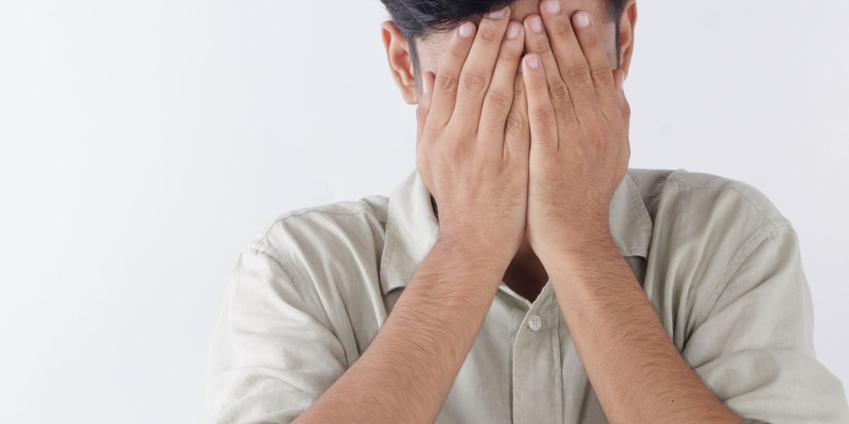 Visualizing the societal pressure on men to suppress emotions, which can exacerbate mental health challenges.