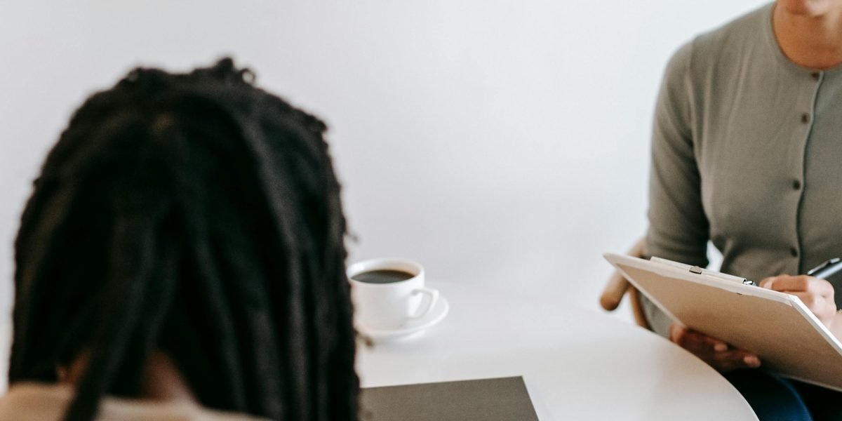 A person engaged in a counseling session, illustrating the process of seeking professional help for emotional challenges.