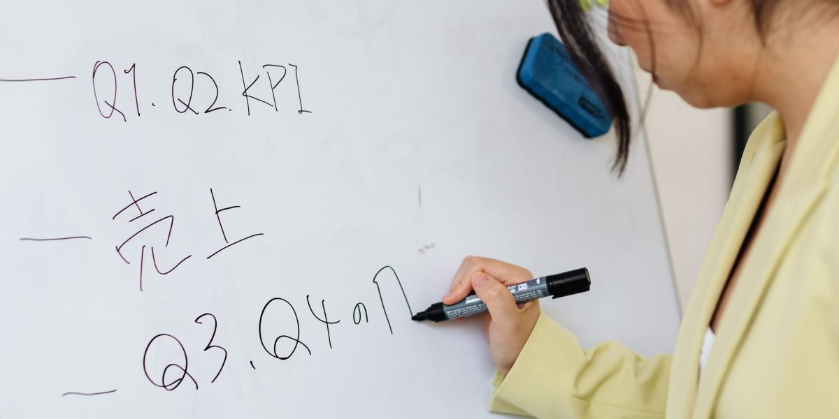 A man confidently planning or making notes, symbolizing proactive steps towards well-being.