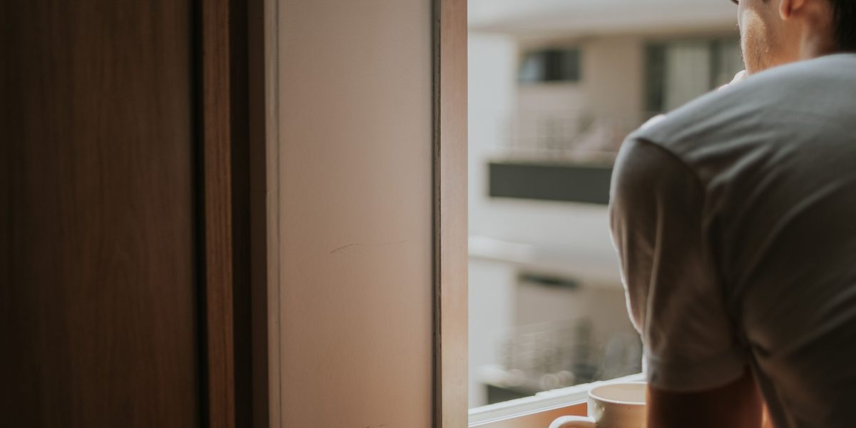 A man reflecting on his desire for deeper connections, a common experience for many men facing loneliness.