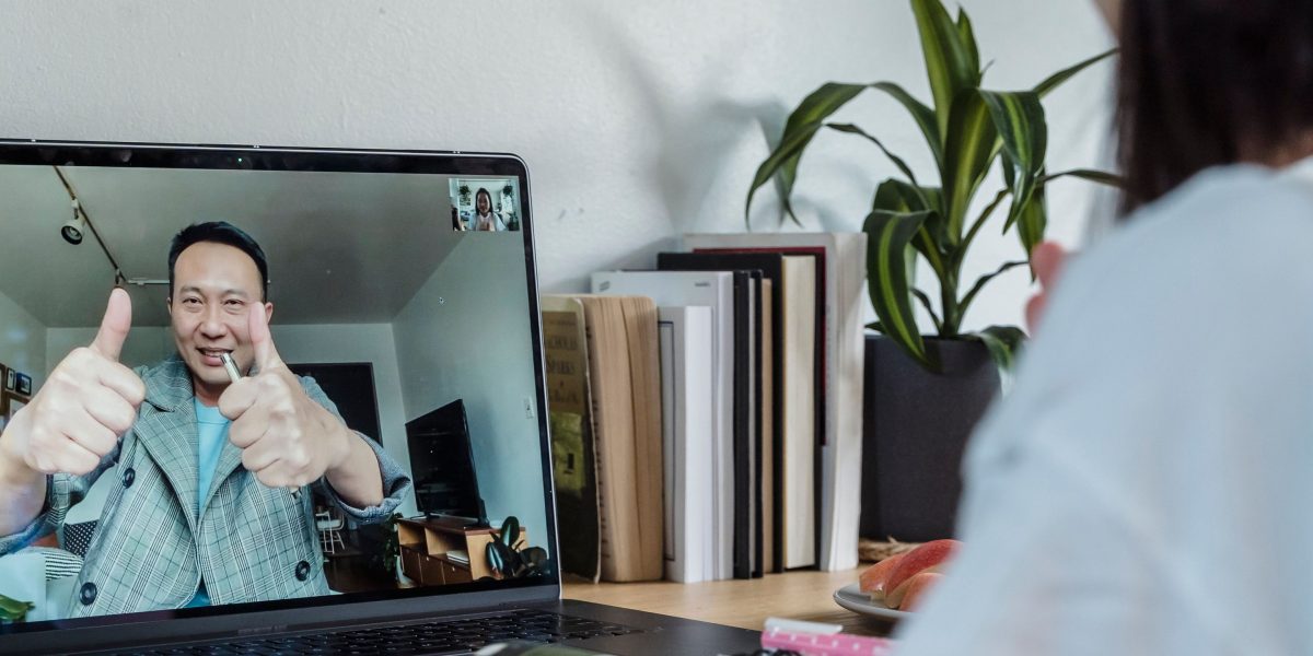 A person engaging in a confidential online therapy session from the comfort of their home.
